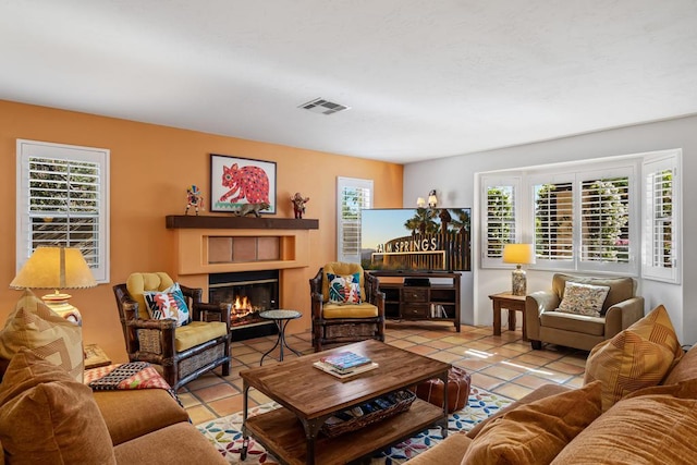 living room with light tile patterned floors