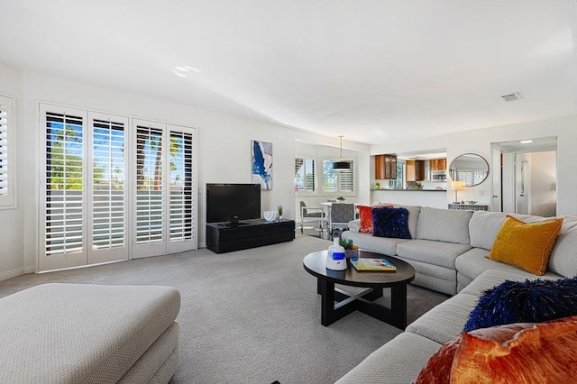 living room with light colored carpet