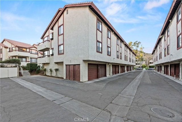 view of building exterior with a garage