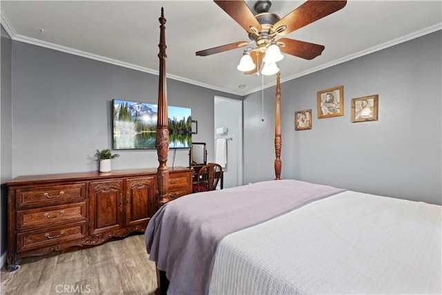 bedroom with ceiling fan, light wood-type flooring, and ornamental molding