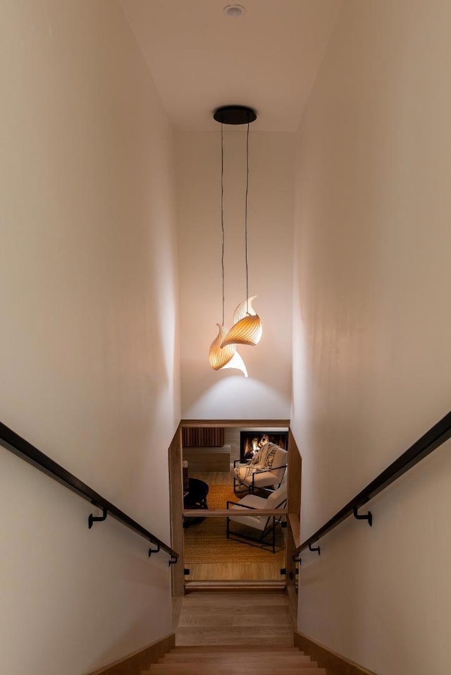 stairway featuring hardwood / wood-style flooring