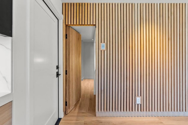 corridor featuring light hardwood / wood-style flooring