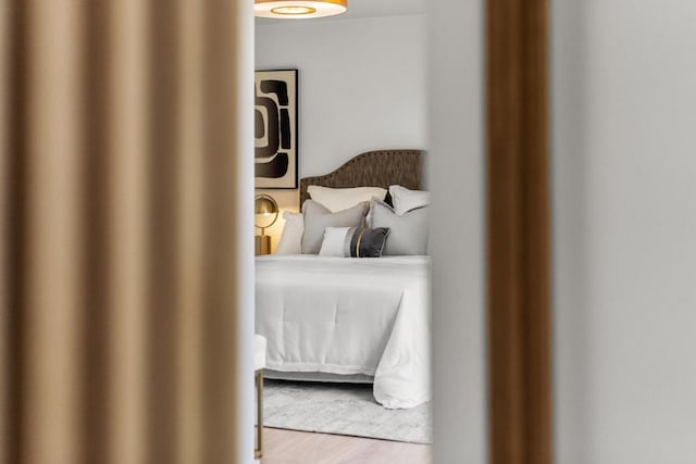 bedroom featuring hardwood / wood-style floors