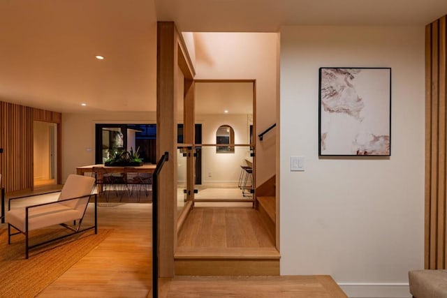 stairway with wood-type flooring