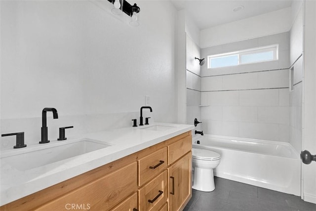 full bathroom featuring vanity,  shower combination, and toilet