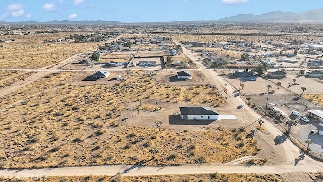 aerial view featuring a mountain view