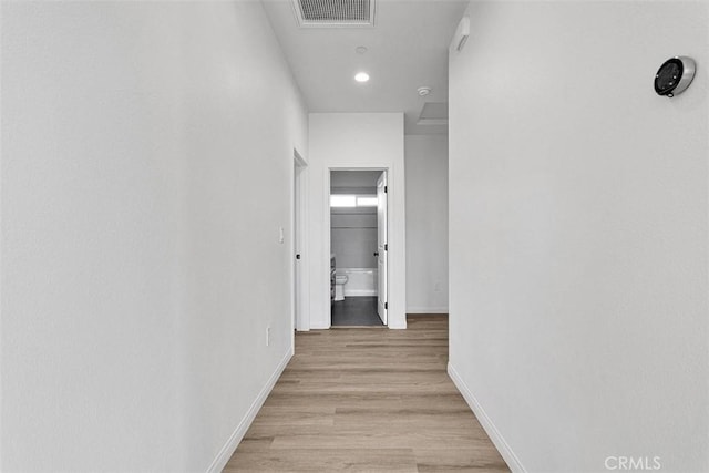 hallway featuring light hardwood / wood-style floors