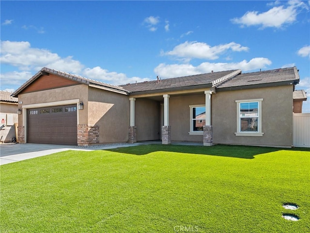 view of front of home with a garage and a front yard