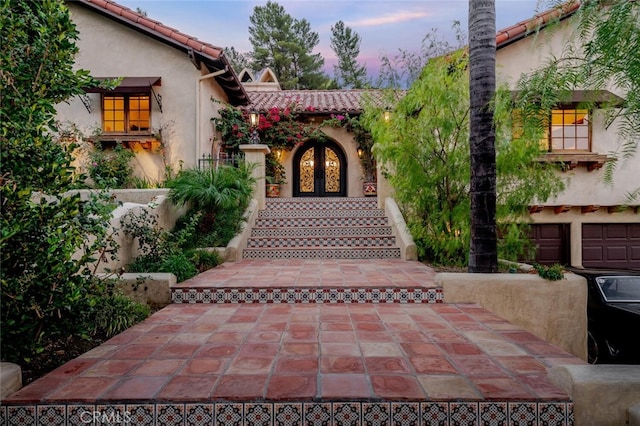 exterior space with a garage