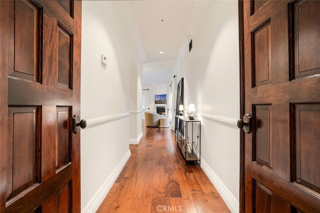 entrance foyer featuring dark hardwood / wood-style flooring and ornamental molding