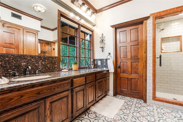 bathroom featuring backsplash, an enclosed shower, and ornamental molding