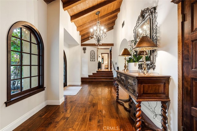 corridor featuring wooden ceiling, high vaulted ceiling, dark hardwood / wood-style floors, beam ceiling, and a chandelier