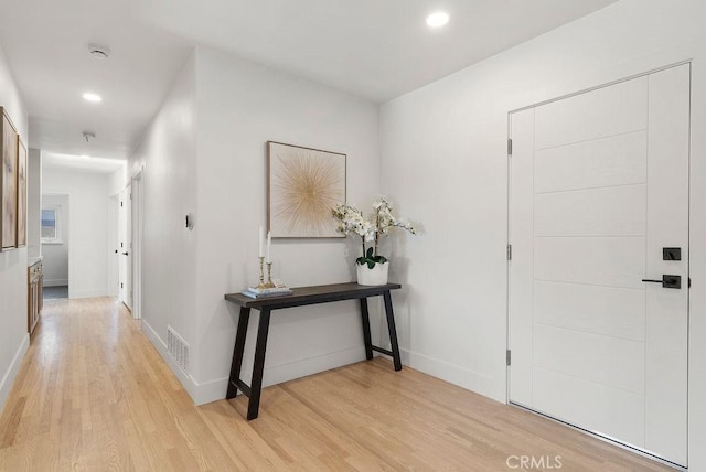 foyer with light hardwood / wood-style flooring