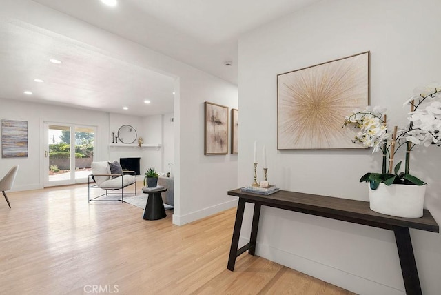 corridor featuring light hardwood / wood-style flooring