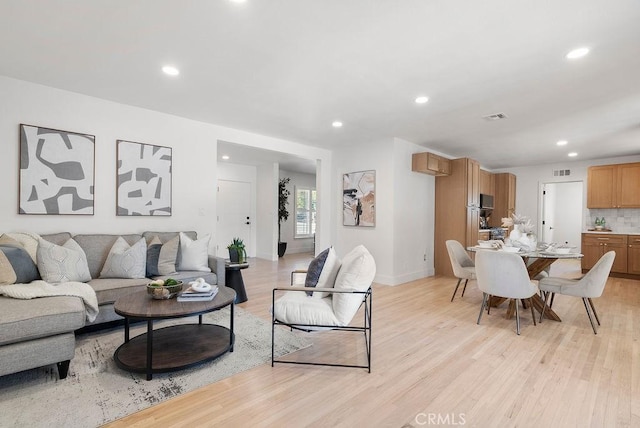 living room featuring light wood-type flooring