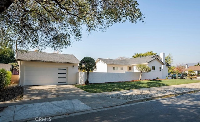 ranch-style home featuring a front yard