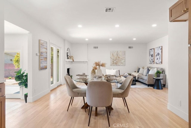 dining area featuring light hardwood / wood-style flooring