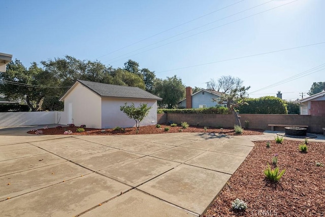 view of patio / terrace featuring a fire pit