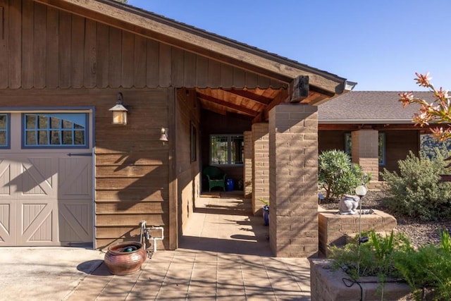 property entrance featuring a garage