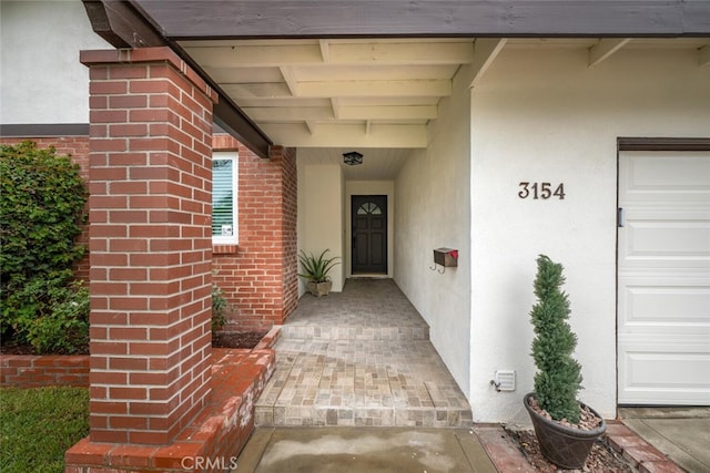 entrance to property with a garage