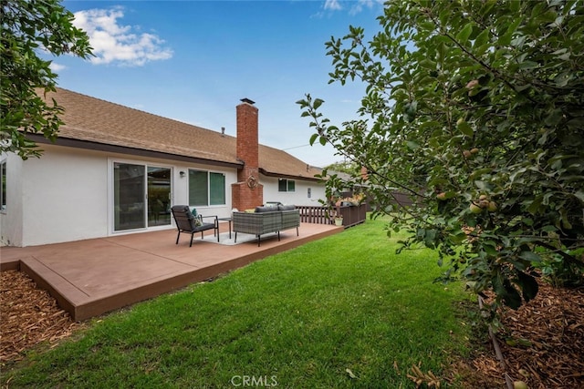 view of yard with an outdoor living space and a patio