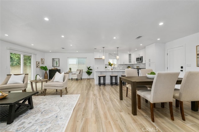 dining area featuring light hardwood / wood-style floors