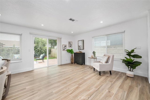 living area featuring light hardwood / wood-style floors