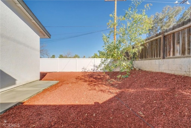 view of yard featuring a fenced backyard