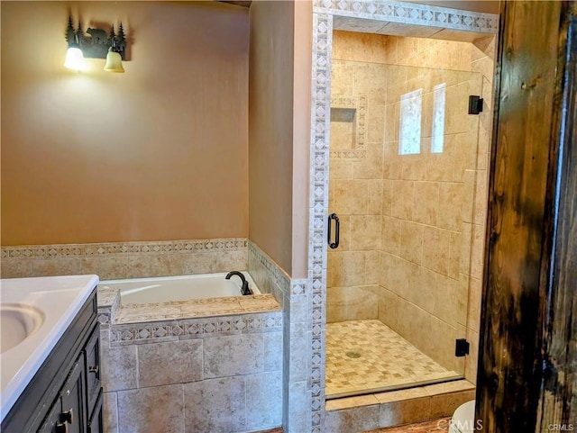 bathroom with plus walk in shower and vanity