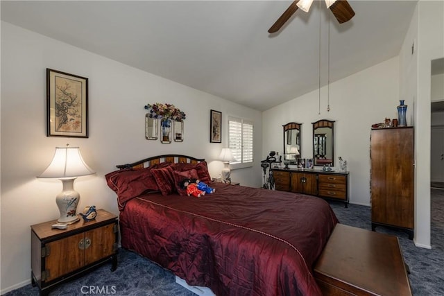 bedroom with carpet flooring, a ceiling fan, and vaulted ceiling