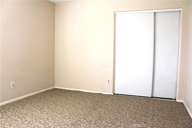 unfurnished bedroom with a closet