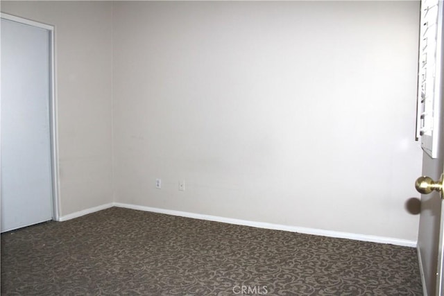 spare room with carpet