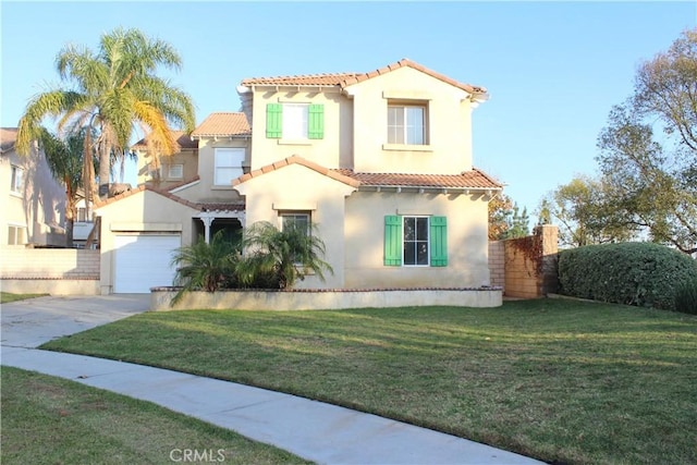 mediterranean / spanish-style home with a front lawn