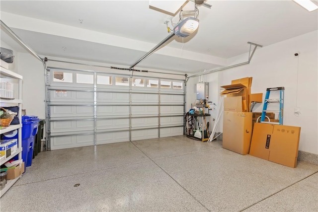 garage with a garage door opener and electric panel