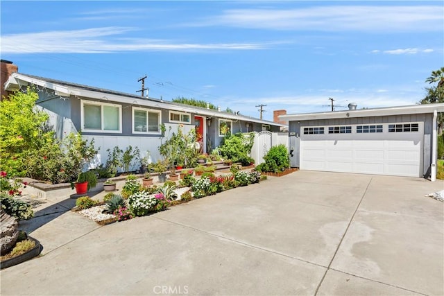 ranch-style house featuring a garage