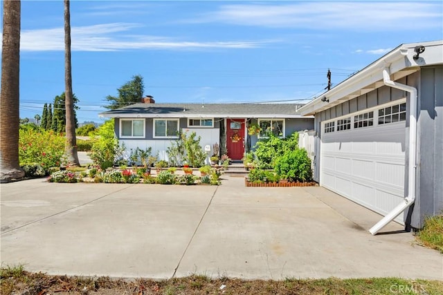 ranch-style home with a garage