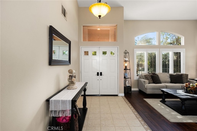 entrance foyer with light hardwood / wood-style flooring