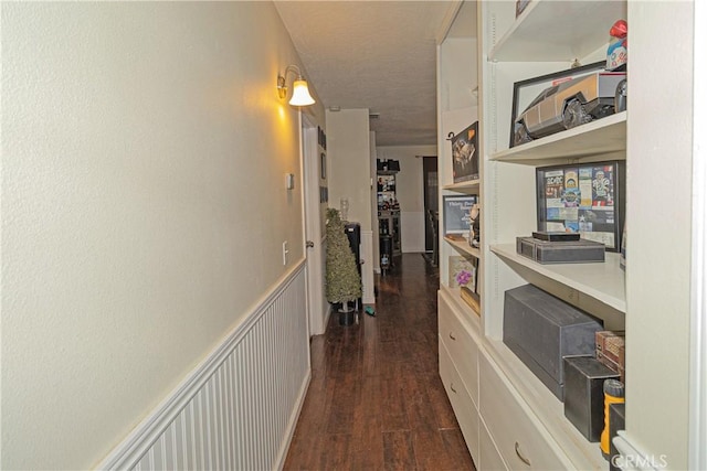 corridor with dark wood-type flooring