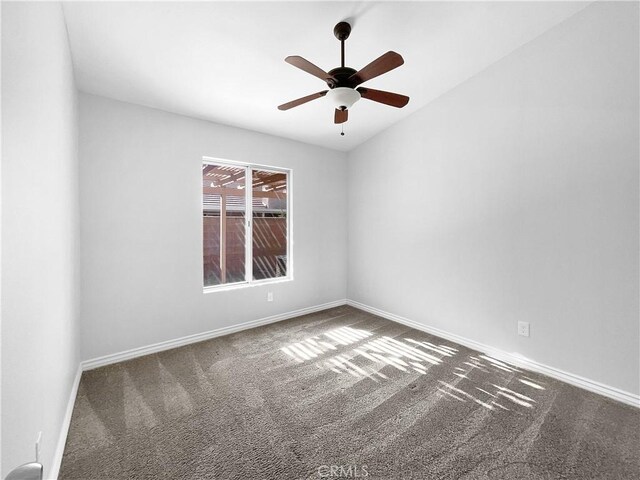 empty room featuring carpet flooring and ceiling fan