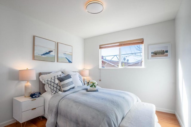 bedroom featuring wood-type flooring