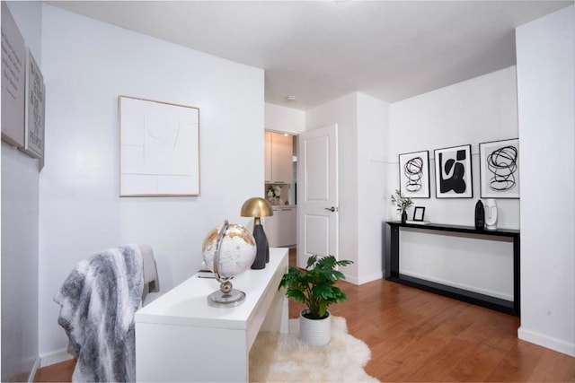 interior space with hardwood / wood-style floors