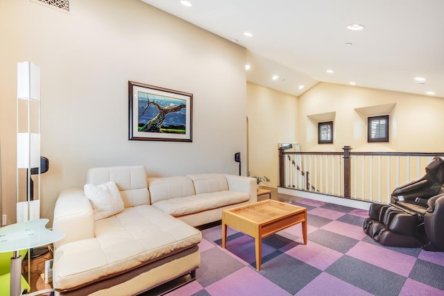 living room featuring carpet and lofted ceiling