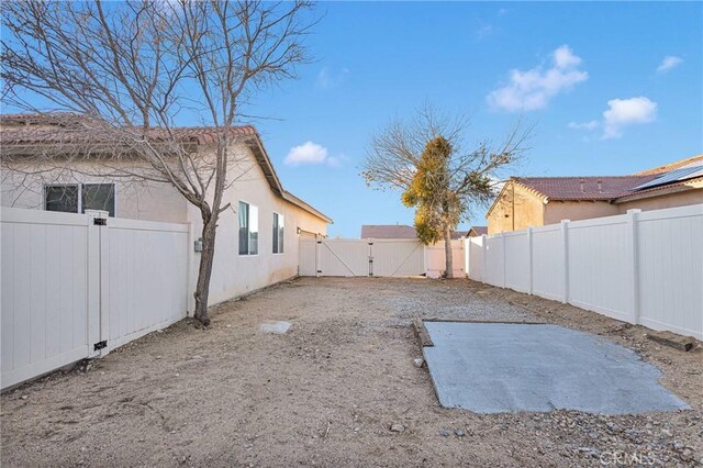 view of yard with a patio area