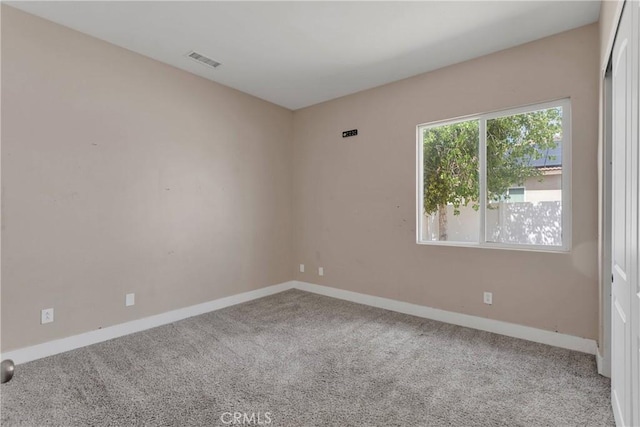 12573 Cabazon Ct, Apple Valley, CA 92308 - spare room featuring baseboards, carpet flooring, and visible vents