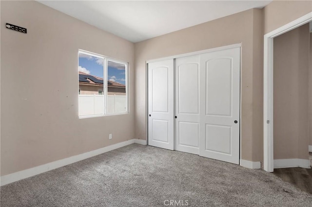 12573 Cabazon Ct, Apple Valley, CA 92308 - unfurnished bedroom featuring baseboards, carpet floors, and a closet