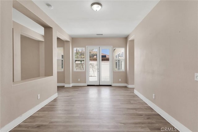 12573 Cabazon Ct, Apple Valley, CA 92308 - unfurnished room with baseboards and wood finished floors