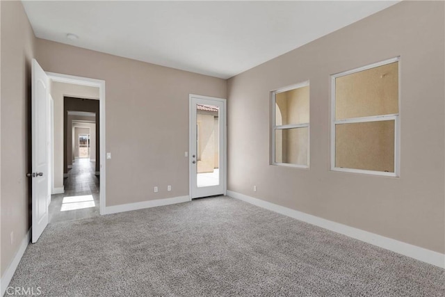 12573 Cabazon Ct, Apple Valley, CA 92308 - unfurnished bedroom with carpet flooring and baseboards