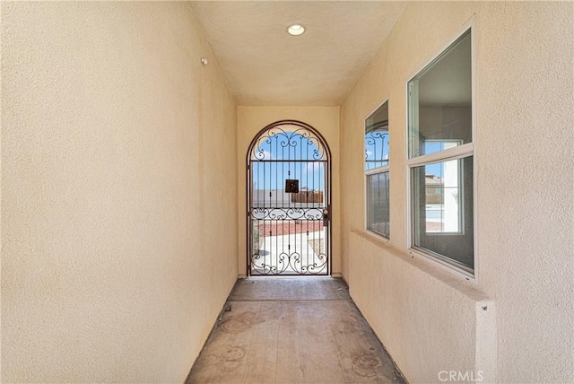 12573 Cabazon Ct, Apple Valley, CA 92308 - doorway to outside with a textured wall