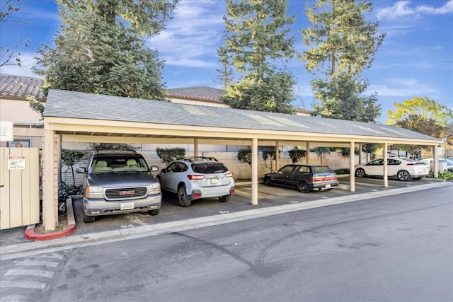 view of parking with a carport