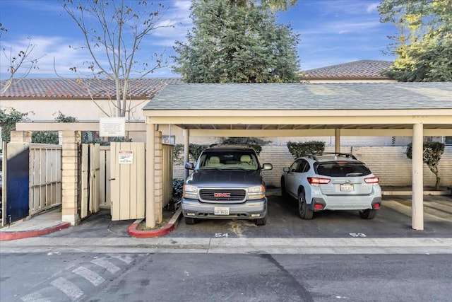 view of car parking featuring a carport